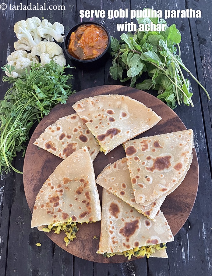 Step 44 – Serve&nbsp;<strong>gobi pudina paratha</strong>&nbsp;with achar.