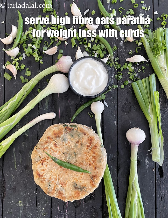 Step 39 – Serve<strong>&nbsp;high fibre oats paratha for weight loss &nbsp;</strong>with curds.&nbsp;See <a href="https://www.tarladalal.com/how-to-make-curd-or-dahi-at-home-2790r">how to make curds</a>.