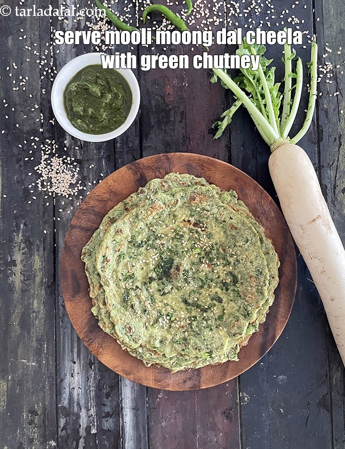 Step 37 – Serve&nbsp;mooli moong dal chilla with green chutney.