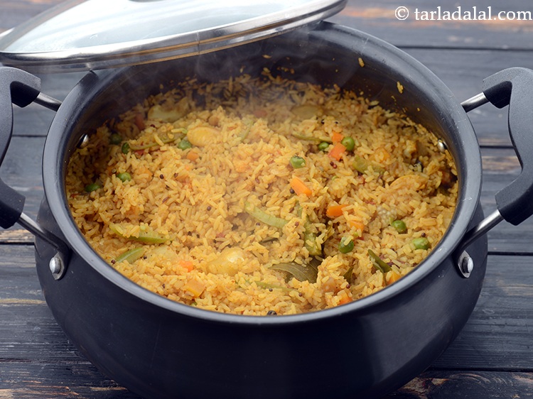 Step 50 – Stir the rice in between the final cooking but do it gently.&nbsp;