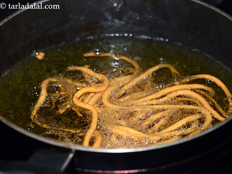 Step 26 – Always deep-fry on a slow flame or ele they will get burnt easily and yet …