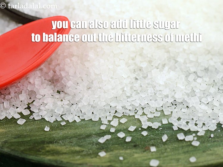 Step 28 – You can also add little sugar to balance out the bitterness of methi.&nbsp;