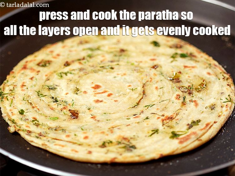 Step 37 – Press and cook the paratha so all the layers open and it gets evenly cooked.