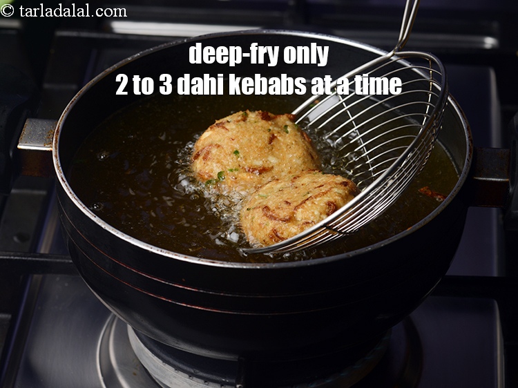 Step 24 – Deep-fry only 2 to 3 dahi kebabs at a time.&nbsp;