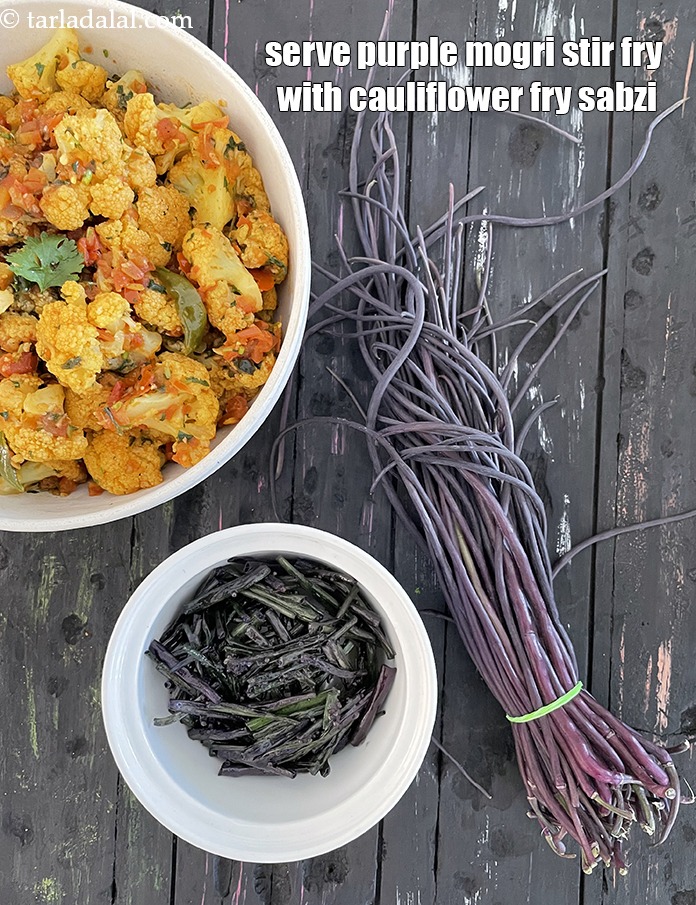 Step 22 – Serve purple mogri stir fry with <a href="https://www.tarladalal.com/cauliflower-stir-fry-22677r">cauliflower stir fry sabzi</a> or any Indian sabzi.