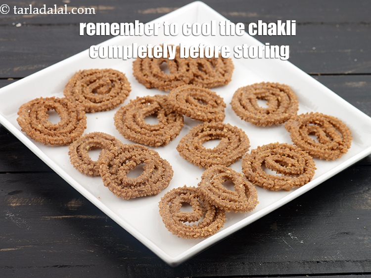 Step 27 – Remember to cool the chakli completely before storing. Even slight warmth can make the chakli …