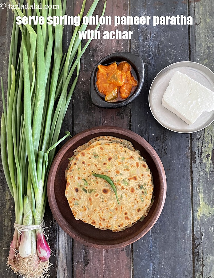 Step 28 – Serve <meta charset="UTF-8" /><strong>spring onion paneer paratha&nbsp;</strong>with achar.