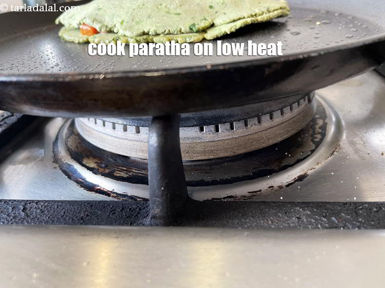 Step 41 – Cook this paratha always on a low flame.