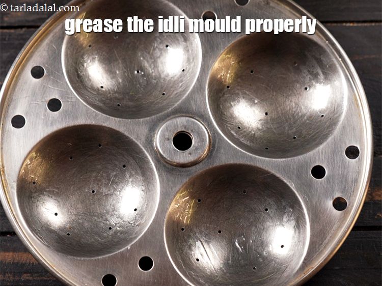 Step 27 – Grease the idli mould properly.
