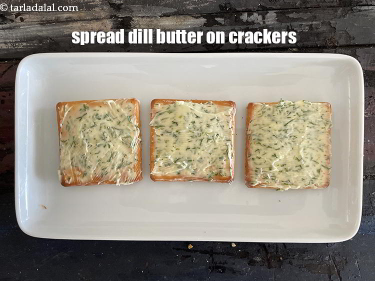 Step 20 – Spread dill butter on crackers.