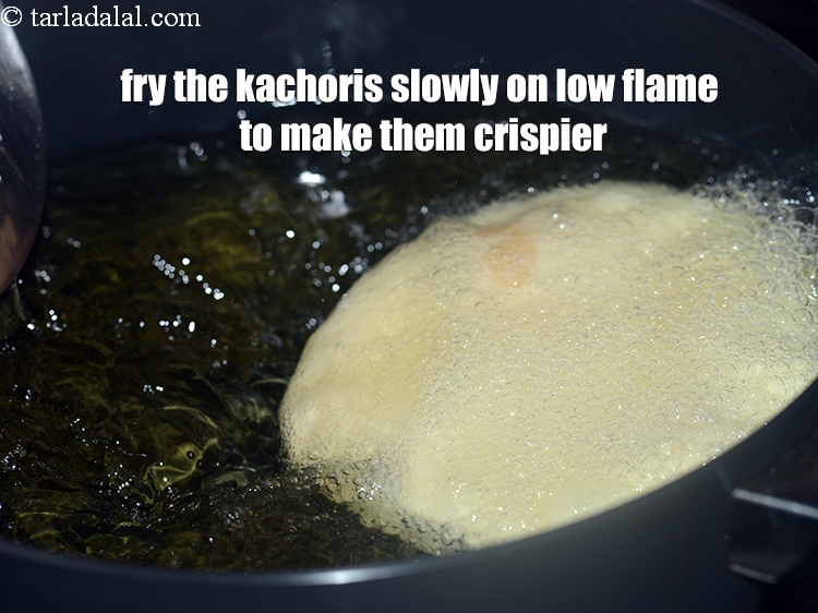 Step 62 – Fry the kachoris slowly on low flame to make them crispier.