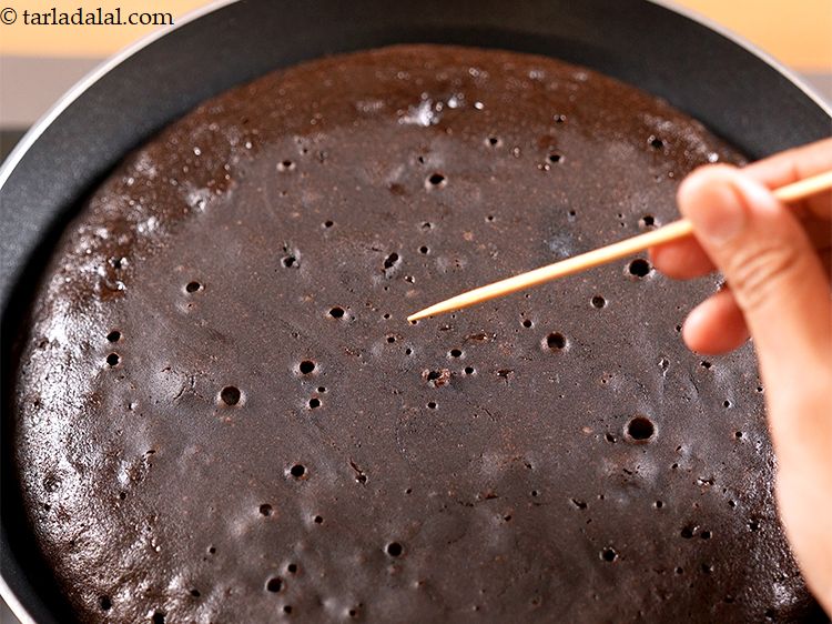 Step 21 – Insert the toothpick to check whether the cake is completely cooked or not.