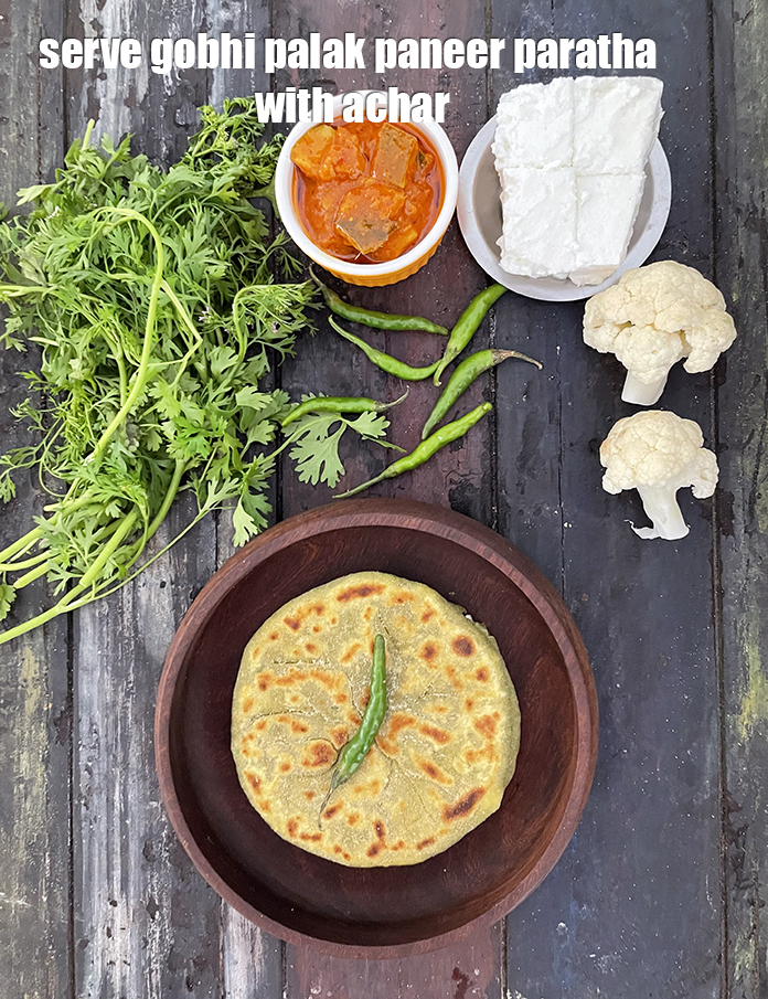 Step 48 – Serve <strong>gobhi paneer palak paratha&nbsp;</strong>with aam achar.