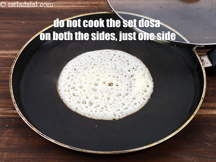 Step 22 – Do not cook the set dosa on both the sides, cook just one side.