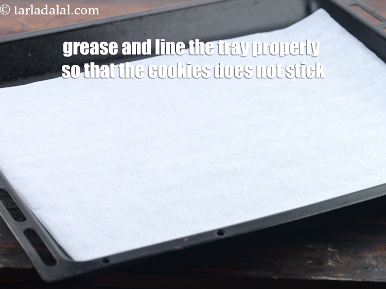 Step 26 – Grease and line the tray properly so that the cookies does not stick.&nbsp;