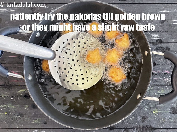 Step 29 – <meta charset="UTF-8" />Also make sure you patiently fry the pakodas till golden brown, or they …