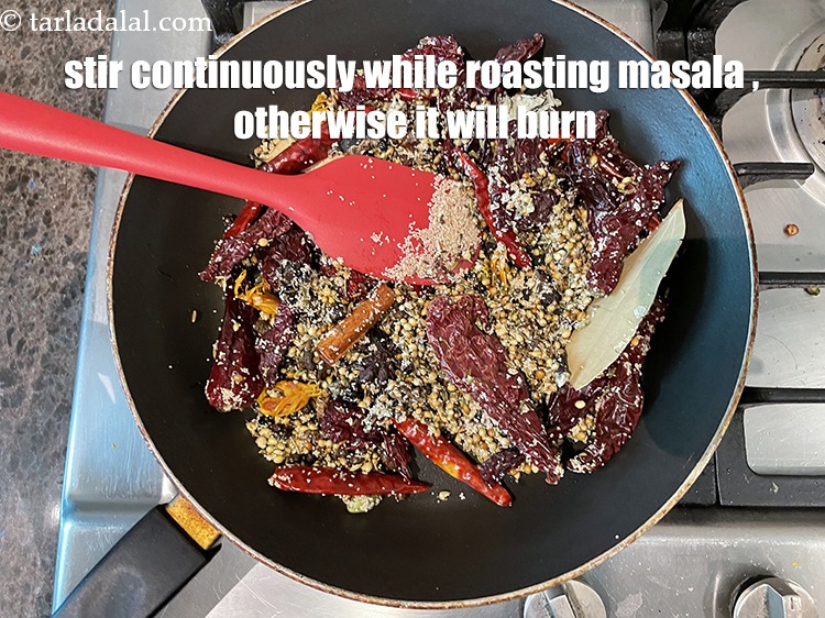 Step 35 – Stir continuously while roasting the Malvani masala otherwise the whole spices will burn and will …