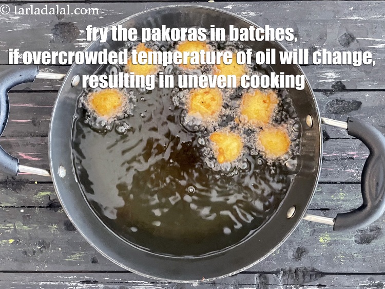 Step 30 – <meta charset="UTF-8" />It is very important to fry the pakodas in batches. If you overcrowd …