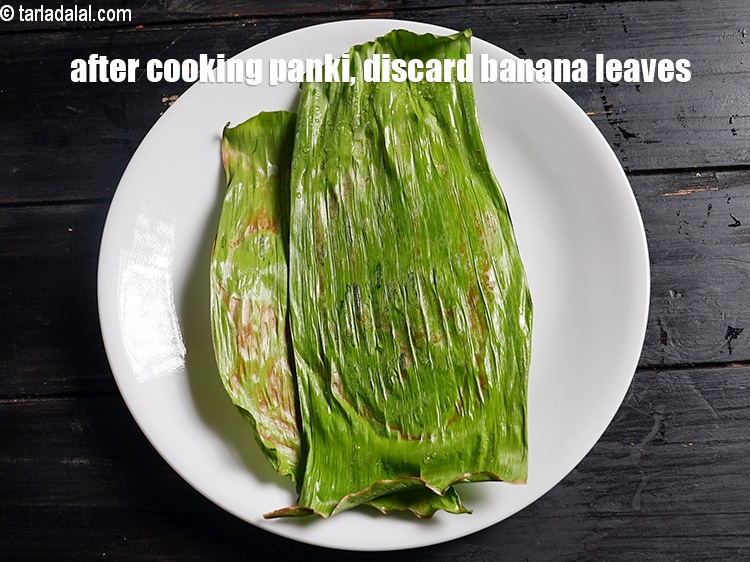 Step 43 – After cooking panki, discard banana leaves.