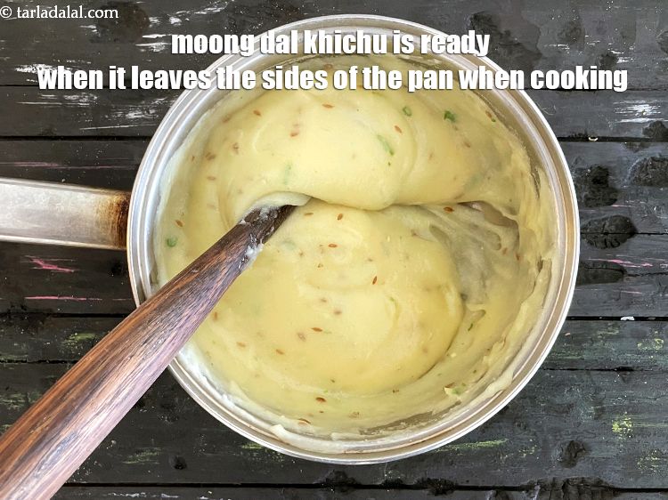 Step 34 – <strong>moong dal khichu</strong>&nbsp;is ready when it leaves the sides of the pan.