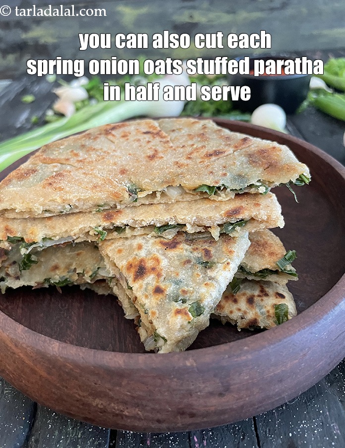 Step 42 – You can cut the&nbsp;<strong>oats and spring onion paratha </strong>in half and serve.