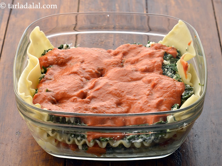 Step 7 – The tomato pulp and spinach stuffing can be made in advance, but assemble and bake …