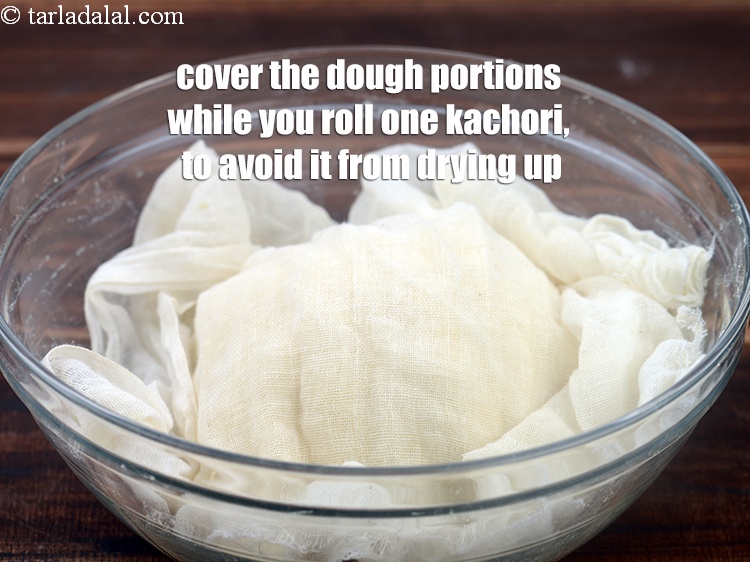 Step 64 – Cover the dough portions while you roll one kachori, to avoid it from drying up.
