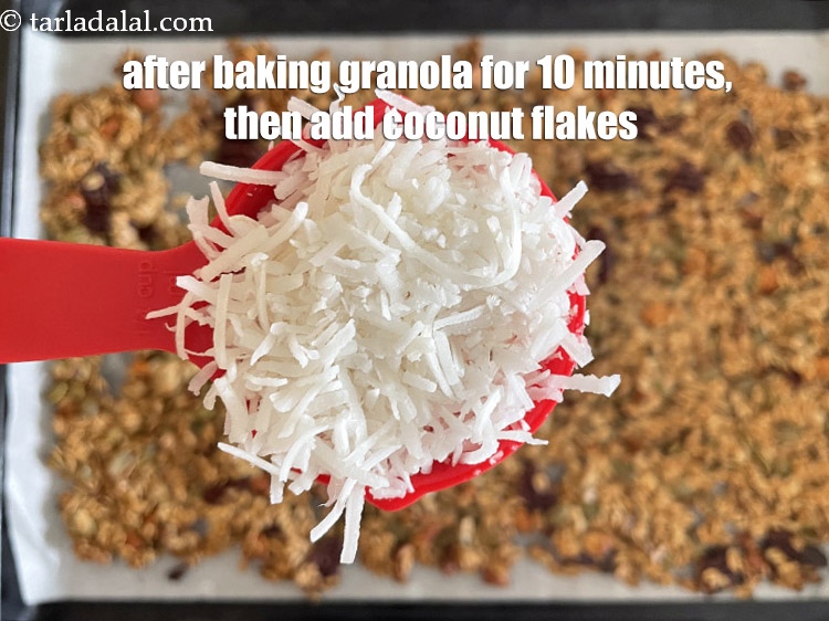 Step 33 – After you have baked the granola for 10 minutes, you can add 1/4 cup coconut …
