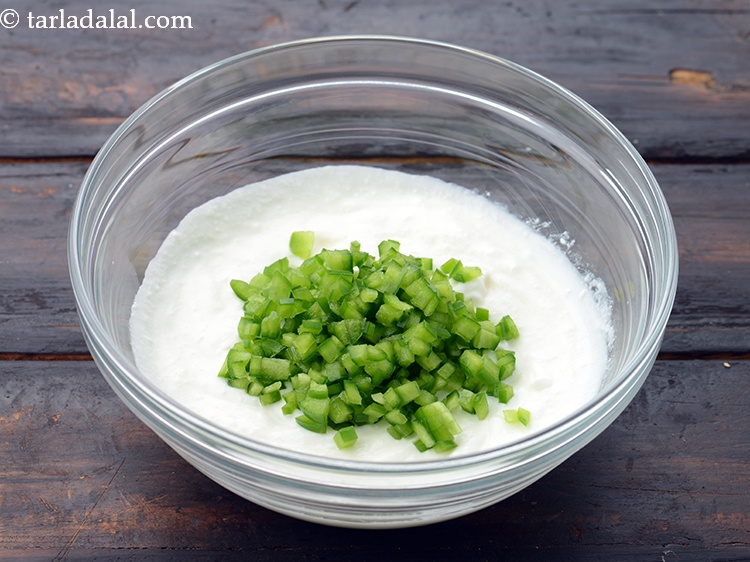 Step 26 – Add 1/4 cup&nbsp;finely&nbsp;<a href="https://www.tarladalal.com/glossary-chopped-capsicum-164i">chopped capsicum</a>.