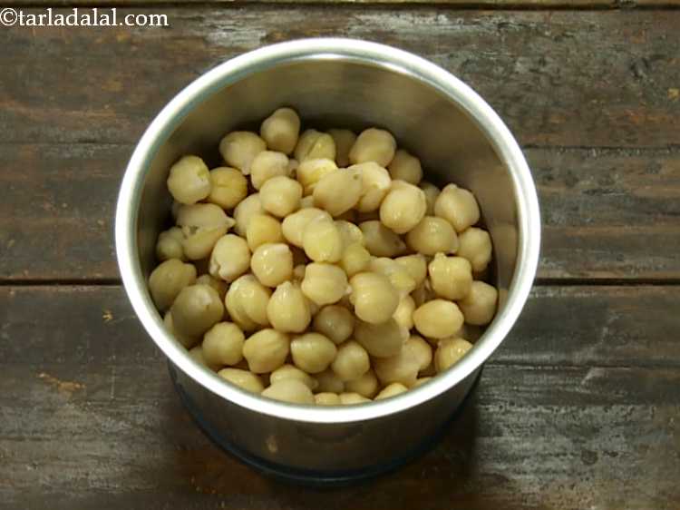 Step 1 – Take a small jar of the blender and put the soaked and boiled chickpeas in …