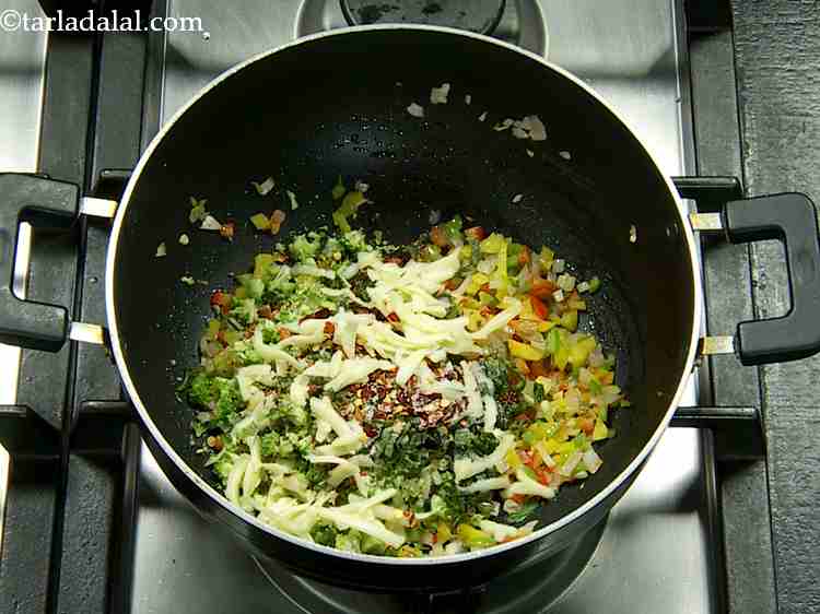 Step 12 – Finally add the cheese and salt to the veggies and saut? on a medium flame …