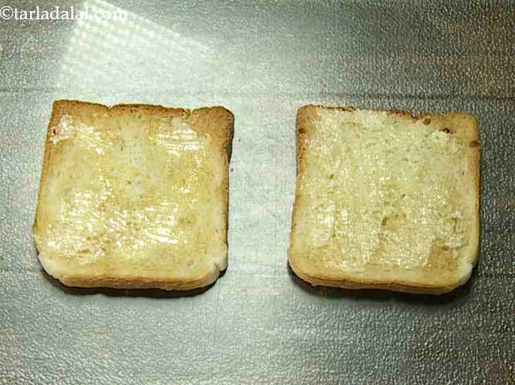 Step 16 – Spread 1/2 tsp of butter on each slice of bread.