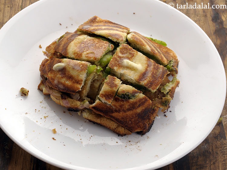 स्टेप 17 – इसके ऊपर समान रूप से १/२ टीस्पून मक्खन लगाएं।