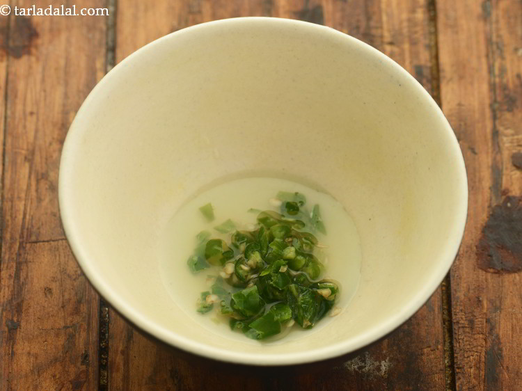 Step 11 – Add some finely chopped green chillies to it.