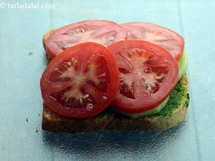 Step 15 – Place 4 tomato slices.