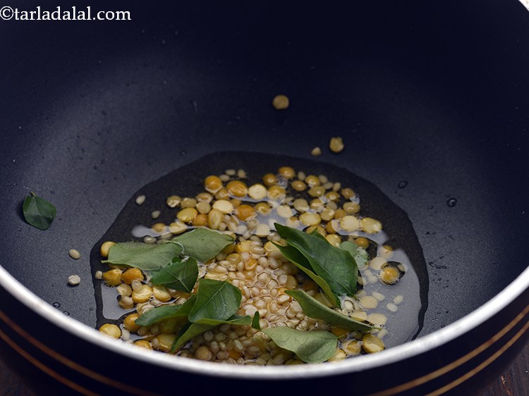 Step 6 – Add curry leaves. It adds freshness to the <strong>tomato chutney</strong>.&nbsp;