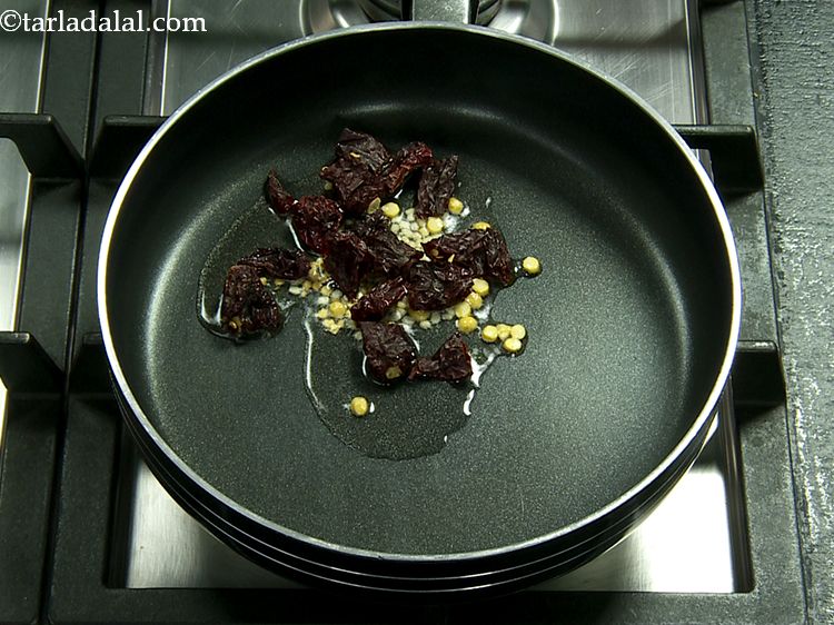 Step 6 – Add the red chillies.