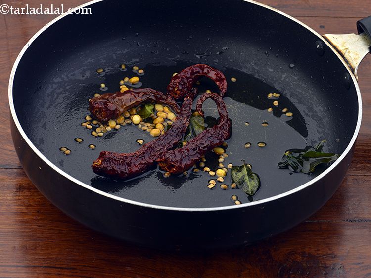 Step 8 – Saut&eacute; on a medium flame for a few seconds or till the dals are light …