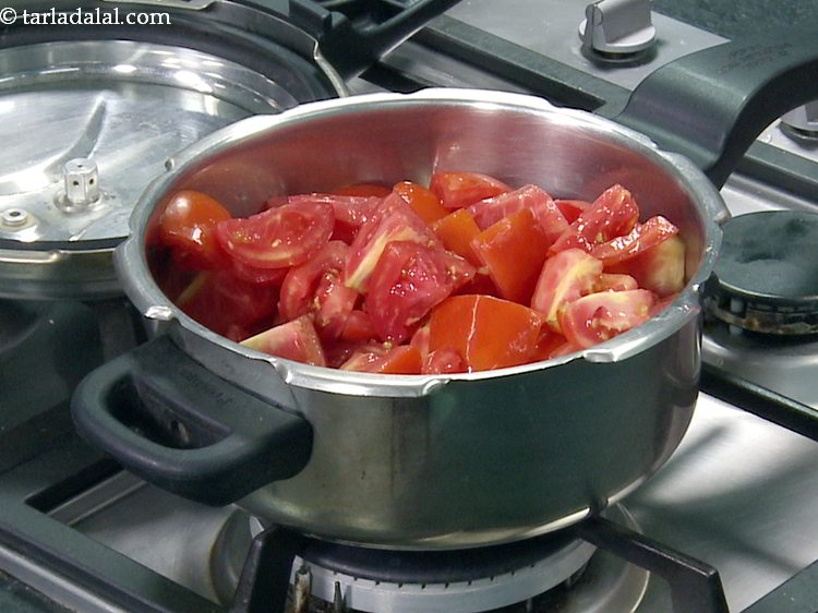 Step 11 – Transfer the tomatoes in the pressure cooker. For an added flavour, you can also add …
