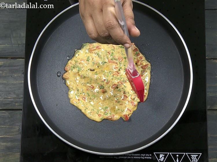 स्टेप 19 – टमाटर ऑमलेट को मध्यम आंच पर पकाएं। टमाटर आमलेट के …