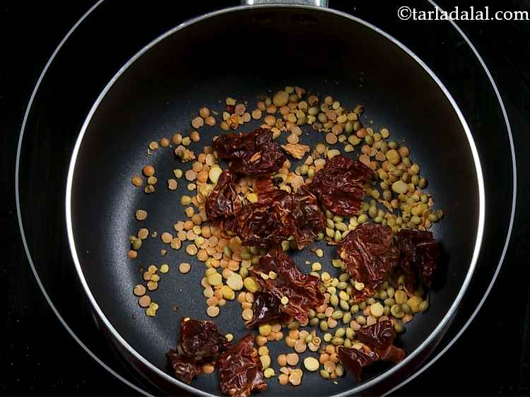 Step 4 – Now we will add the Kashmiri dried chillies that are broken into pieces.