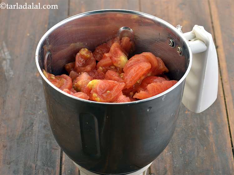 Step 7 – Once the tomatoes are soft and cooked, transfer them in a mixer jar.