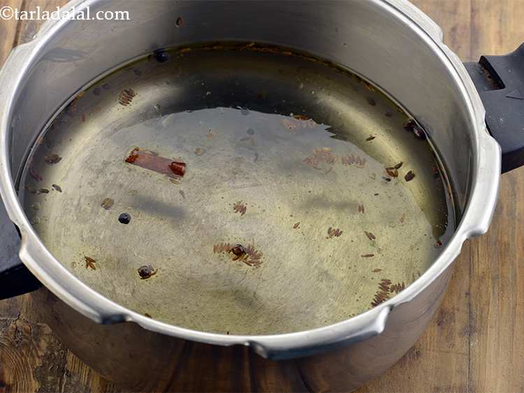 Step 18 – Add 3&frac12; cups of hot water. Hot water fastens the cooking process. This khichdi won&rsquo;t …