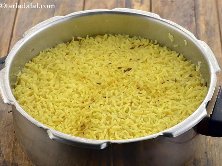 Step 19 – Pressure cook for 4 whistles. Allow the steam to escape before opening the lid or …