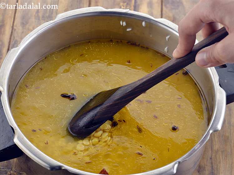 Step 10 – Mix well so the masalas are spread evenly.