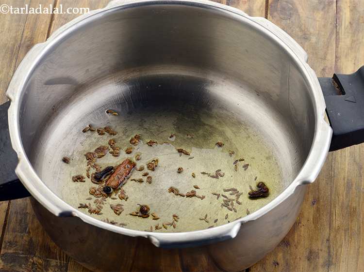 Step 6 – Now add the whole spices viz. cloves, peppercorns and cinnamon and saut&eacute; on a medium …