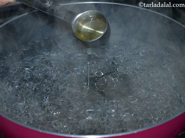 Step 17 – Also add 1 tbsp of oil to this. This prevents the rice grains from sticking …