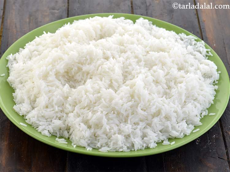 Step 22 – Spread the cooked Rice on a flat surface or a big plate and allow it …