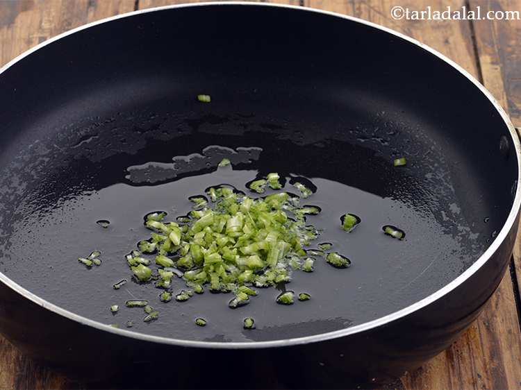 Step 23 – Take a wok or broad non-stick pan and heat the oil in it, till it …