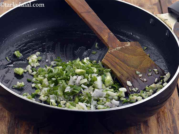 Step 26 – Add the spring onions.&nbsp; Almost all Indo-Chinese recipes make use of spring onions.
